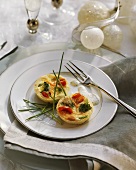 Small vegetable quiche with herb cream