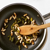 Toasting pistachios and pine nuts