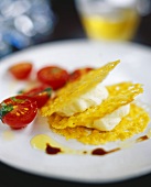 Thin potato pancake with soft cheese mousse & tomatoes