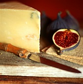 Still life with cheese and fig