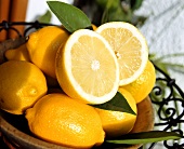 Lemons with leaves in a bowl