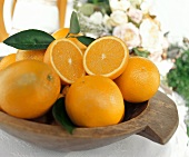 Oranges with Leaves in Bowl