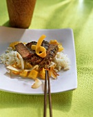 Ostrich steak with mango and coconut sauce