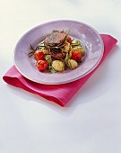 Ostrich medallions with rosemary on gnocchi