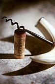 Wine cork (Chateau Talbot) with old corkscrew