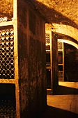 Wine bottles stored in stone racks, Winzerhof Gietzen, Mosel