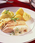 Salmon trout with cheese & tarragon stuffing, potatoes & fennel