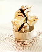 Meringue biscuits with chocolate cream filling