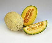Whole, half and quarter galia melon