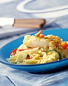Rice with cod ragout and vegetables