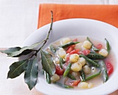 Potato soup with green beans and tomatoes