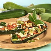 Courgette halves stuffed with vegetables & sheep's cheese 