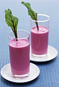 Beetroot yoghurt drink garnished with beetroot leaves
