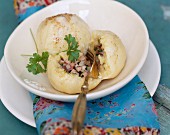 Potato and cheese dumplings with ham stuffing