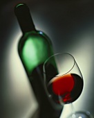 Red wine in glass and bottle
