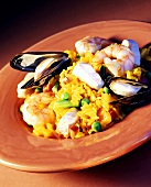 Paella with seafood and vegetables