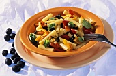 Rigatoni with peppers and black olives