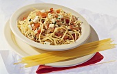 Spaghetti with tomatoes, mozzarella and herbs