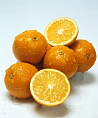Oranges with drops of water