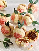 Small apricot-shaped cakes with nut filling