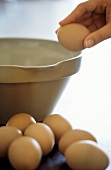 Breaking an egg