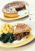 Beef pie with mashed potatoes and kale