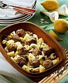 Meatballs with potatoes and onions in Römertopf