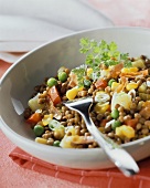 Lentil stew with ham and vegetables