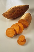 Sweet potato, whole, halved and sliced