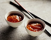 Two bowls of Chinese sauce