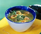 Warm avocado soup with shrimps