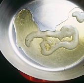 Heating butter and oil in frying pan