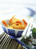 Fried coconut shrimps with honey and soya sauce