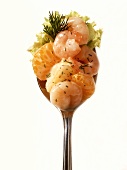 Shrimp cocktail with mandarins on a spoon