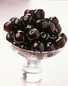 Glazed black cherries