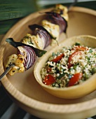 Chicken and onion kebab and bulgur salad (tabbouleh)