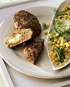 Rissoles stuffed with cheese & sweetcorn & cucumber salad
