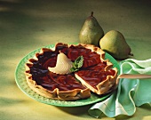 A pear tart with chocolate coating