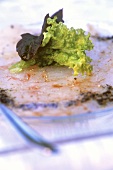 Shrimp carpaccio with truffle oil and lettuce bouquet