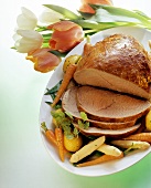 Roast veal with young vegetables