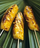 Grilled pineapple kebabs with honey and lemon zest