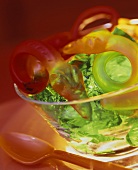 Green jelly with fruit jelly snakes