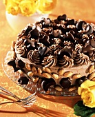 An almond chocolate gateau, decorated with chocolates