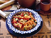 Linsen-Curry mit roten Paprikaschoten und Frühlingszwiebeln