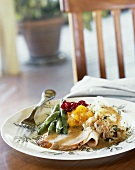 Sliced turkey with traditional accompaniments for Thanksgiving