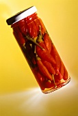 Bottled red chili peppers in jar