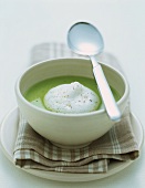 Creamed pea soup with cream topping
