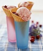 Cherry ice cream in ice cream cornets