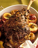 Leg of lamb with pistachios and rosemary peaches