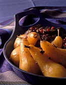 Wild boar with poached pears and cranberries
